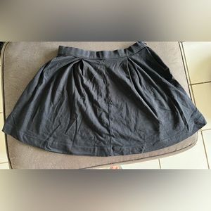 Black Express bell shaped short skirt